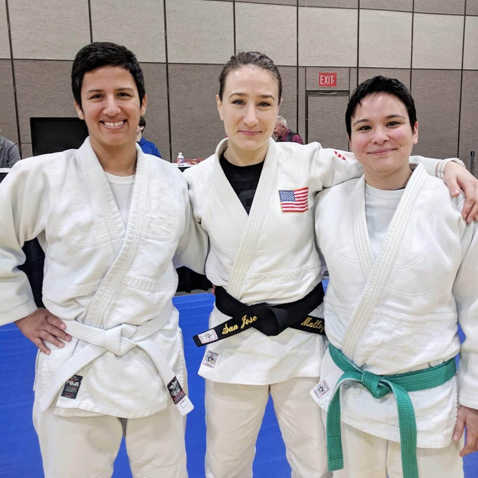 female athletes judokas posing together