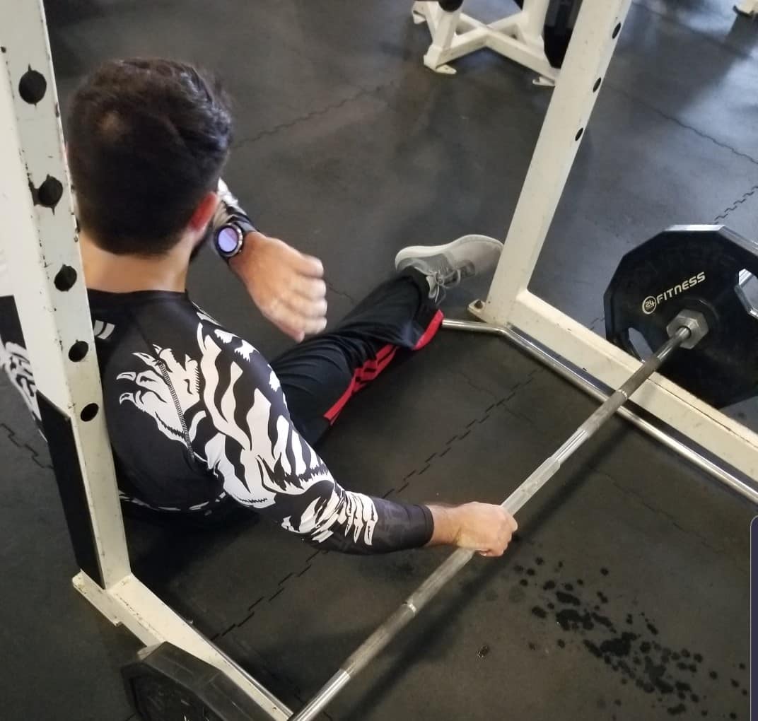 man resting in the floor after rehab injury